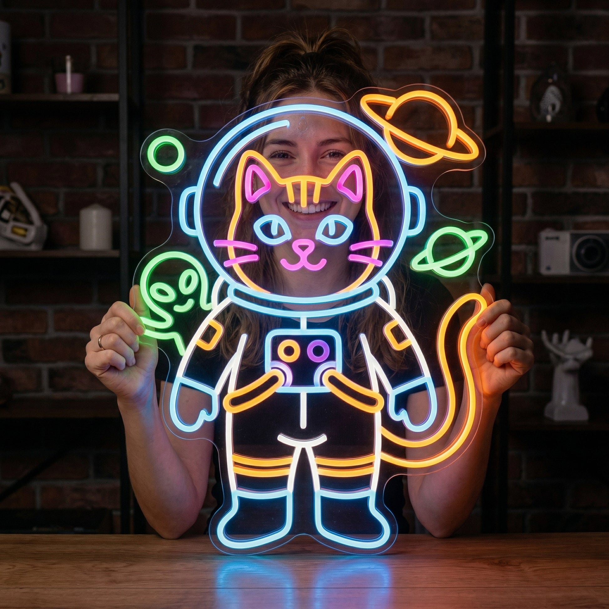 Astronaut Cat LED Neon Sign lifestyle photo - person holding the sign